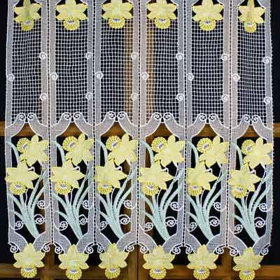 Yellow flowered macrame lace curtain