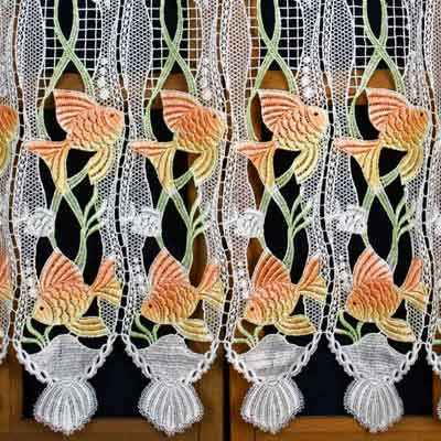Colored fish lace curtain
