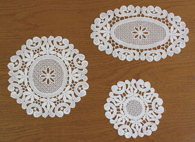 Oval and round lace doily