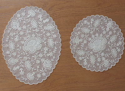 Flora embroidered doilies
