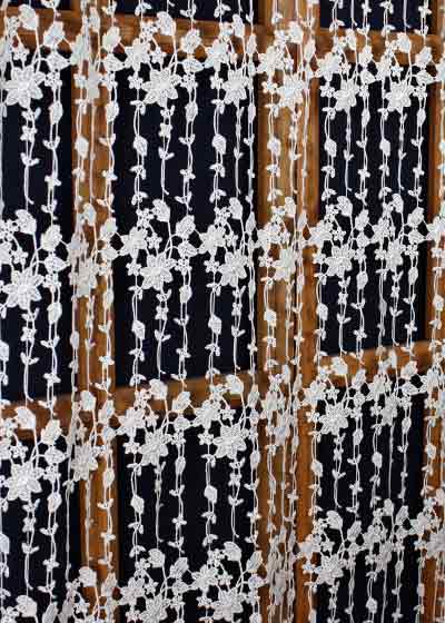Flowered macrame lace curtain
