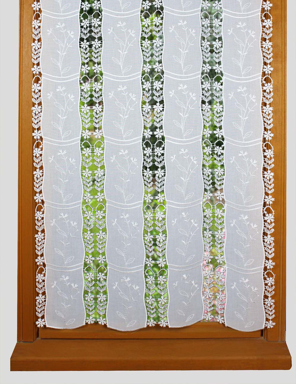 White fabric and macrame lace curtain flower