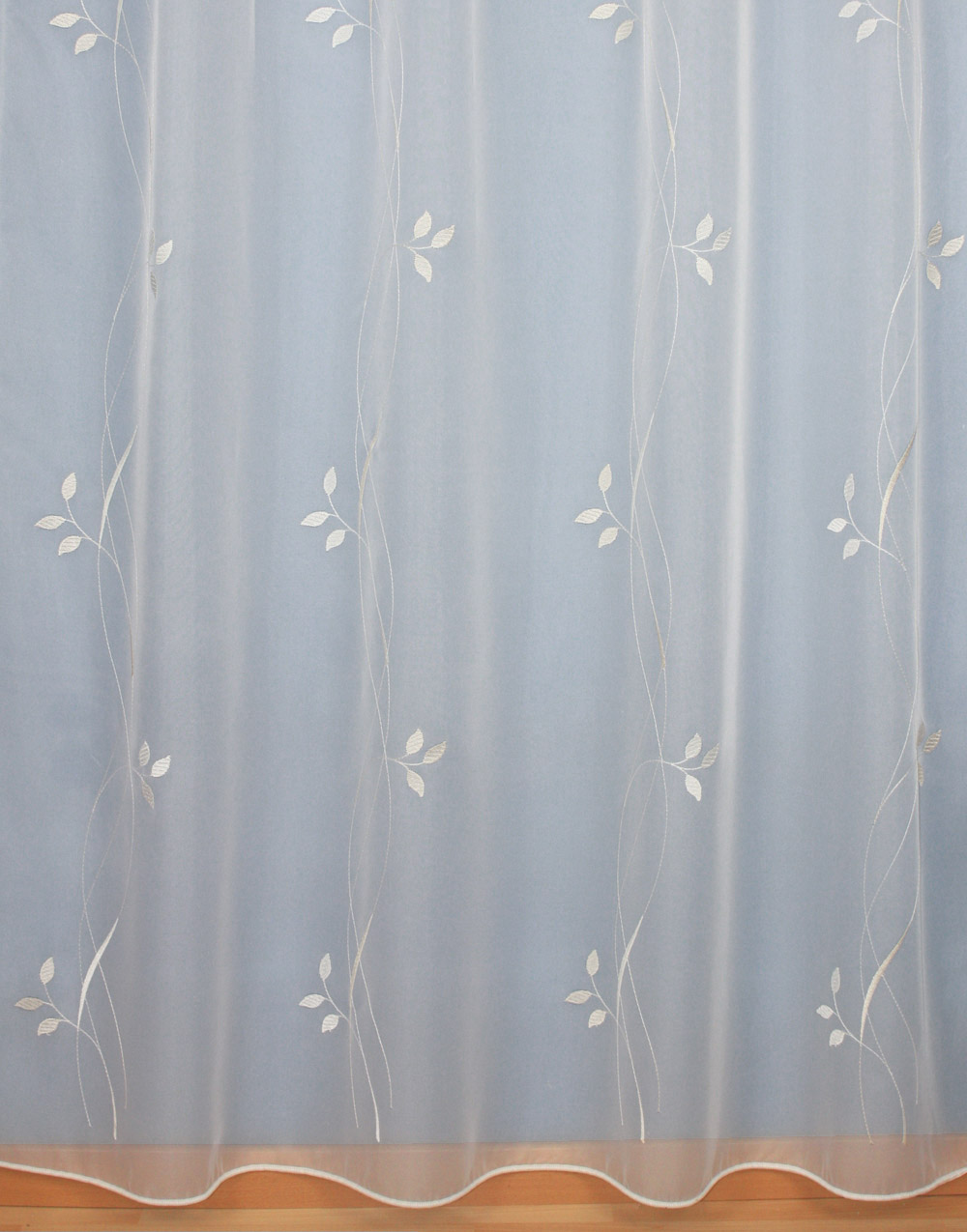 Sheer curtain with ecru embroidery