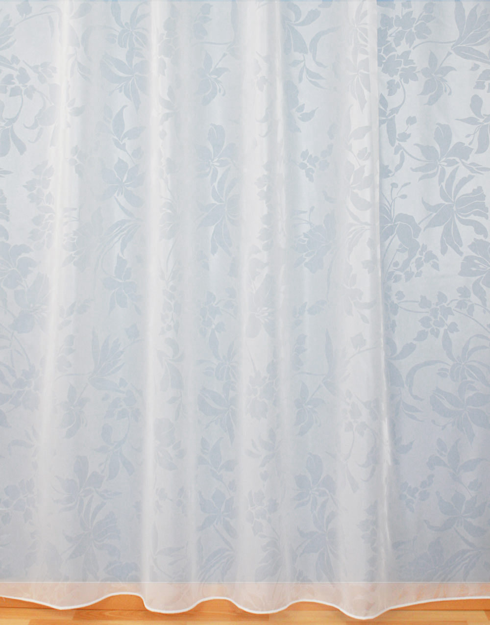 Sheer curtain with white pattern