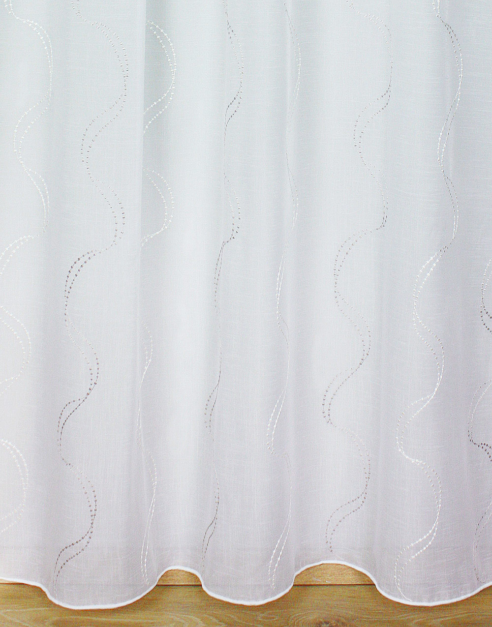Sheer curtain with cream embroidery
