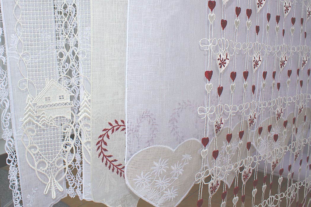 Mountain themed lace curtain